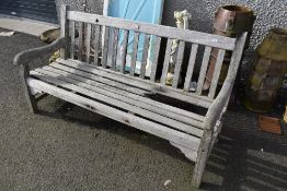 A traditional teak garden bench made from the timber of the yacht Enchantress, approx 168cm