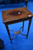An early 20th Century mahogany occasional table