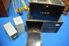 Two large vintage deed boxes with front opening doors and two vintage filing drawers
