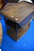 A dark stained Ercol tea trolley