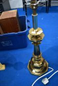 A brass table lamp of large proportions