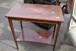 An Edwardian mahogany side table