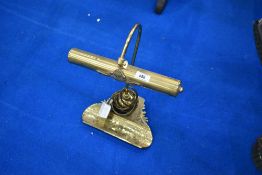 A traditional brass desk lamp