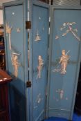 A Japanesque tri fold modesty screen having mother of pearl applique decoration , depicting geisha