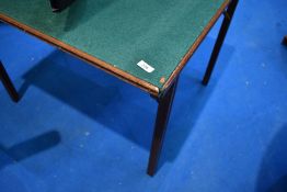 A vintage folding card table