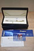An Onoto University of Cambridge limited edition fountain pen 1/200 in solid sterling silver, with