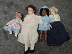 Two early 20th century Armand Marseille bisque headed Dolls having seep eyes, open mouth with four
