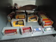 A shelf of 1980's & 1990's Corgi die-casts, Classics and Original Omnibuses, 18 in total