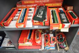 Two shelves of Hornby 00 gauge including R863 Diesel Electric Locomotive D1738, BR Locomotive 37130,
