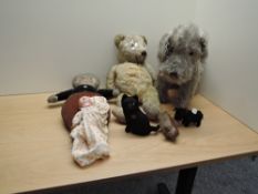 A Merrythought plush Terrier Dog having stitched nose and mouth, plastic eyes, height 34cm, mid 20th