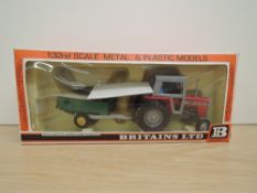 A 1980's Britains model, 9591 Massey Ferguson & Trailer, in original window display box with plastic