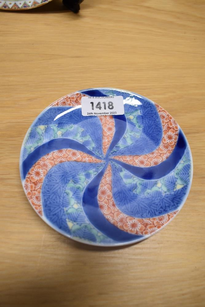 Two Balinese style hand carved figures, a set of five Meiji Imari style geometric plates, a - Image 5 of 6