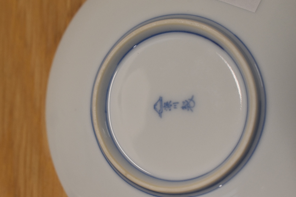 Two Balinese style hand carved figures, a set of five Meiji Imari style geometric plates, a - Image 6 of 6