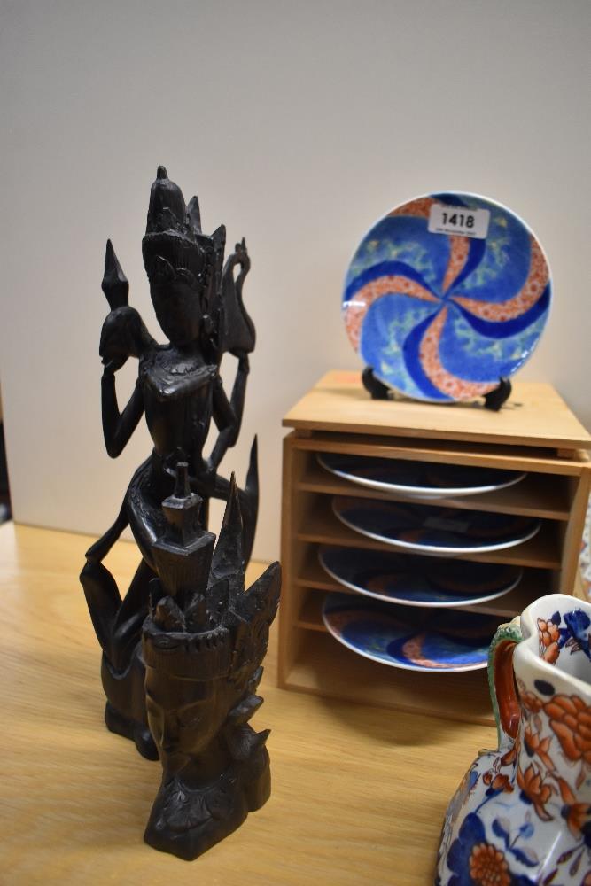 Two Balinese style hand carved figures, a set of five Meiji Imari style geometric plates, a - Image 3 of 6
