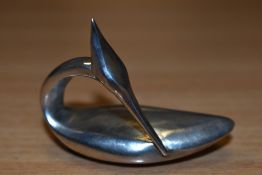 Guy Taplin (b.1939, British), a silver miniature preening grebe study, measuring 7cm long, hallmark