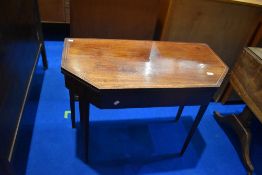 A late Victorian/Edwardian mahogany fold over tea table having line inlay decoration, dimensions