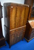 A vintage walnut cocktail cabinet , approx dimensions H153, D43, W69cm