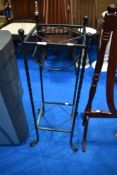 A modern metal plant stand