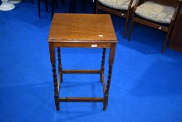 An early 20th Century oak side table having twist frame, dimensions approx. W46 D42 H74cm