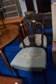 A pair of Georgian mahogany Hepplewhite style dining chairs