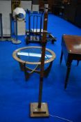 An Art Deco walnut standard lamp