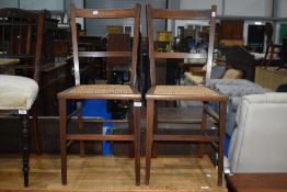 Two Edwardian mahogany cane seated bedroom chairs