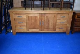 A modern solid oak designer sideboard by Bianchi, approx dimensions W220 H85 D48cm