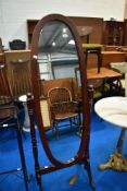 A modern dark stained cheval wall mirror, height approx 151cm