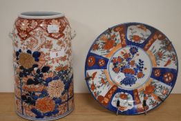 A 19th Century Japanese Imari vase, of elongated pale form, with lion mask handles, and measuring