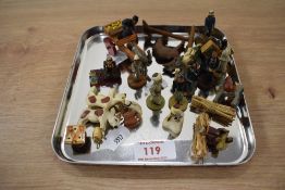 A painted wooden nativity scene.