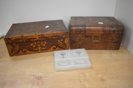 A Victorian walnut and marquetry inlaid writing slope, having a presentation plaque set within the