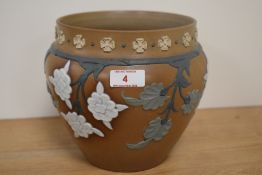 A late 19th/early 20th Century Doulton Lambeth Silicon ware jardiniere, the bround ground