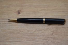 A Parker Duofold propelling pencil in black with decorative broad band to the cap