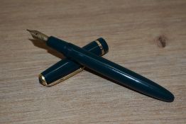 A Parker Duofold aero fill fountain pen in green with narrow decorative band to the cap having