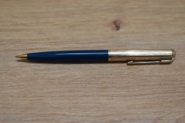 A Parker propelling pencil in Turquoise with 12ct rolled gold cap