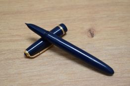 A Parker Duofold Lady aero fill fountain pen in blue with narrow decorative band to the cap