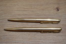 A Parker 50 Falcon Signet aero fill fountain pen, ballpoint pen and propelling pencil in gold