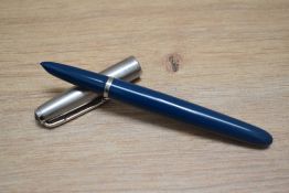 A Parker 51 aero fill fountain pan in turquoise with lustraloy cap. Boxed
