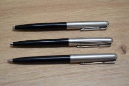 Three Parker ballpoint pens in black with lustraloy caps