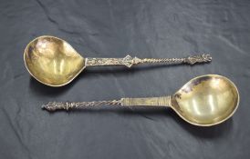 Two interesting 17th/18th century Scandinavian gilt metal apostle spoons, each with circular
