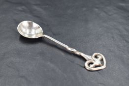 Local interest*A Keswick School of Industrial Arts (K.S.I.A) silver condiment spoon, the planished