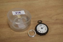A continental silver cased fob watch, with enamelled roman dial and key, plus a contemporary glass