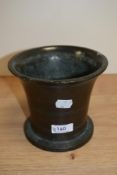 A 18th/ 19th century cast bronze mortar.