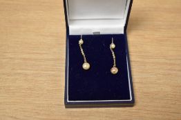 A pair of 9ct gold and simulated pearl drop earrings