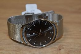 A gent's quartz wrist watch by Skagen, model no: 597LSSM having baton numeral dial and date aperture