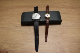A gentleman's Summit wristwatch with silvered dial and another by Secretary