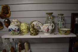 A hollow cast brass Buddha ornament, and an assorted collection of Oriental ware, including ginger