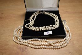 Two cultured pearl necklaces.