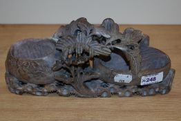A carved soapstone spill vase, depicting foliate decoration, AF.