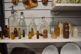 A vintage Taylor & Co. etched glass soda siphon, an assorted collection of codd and other glass